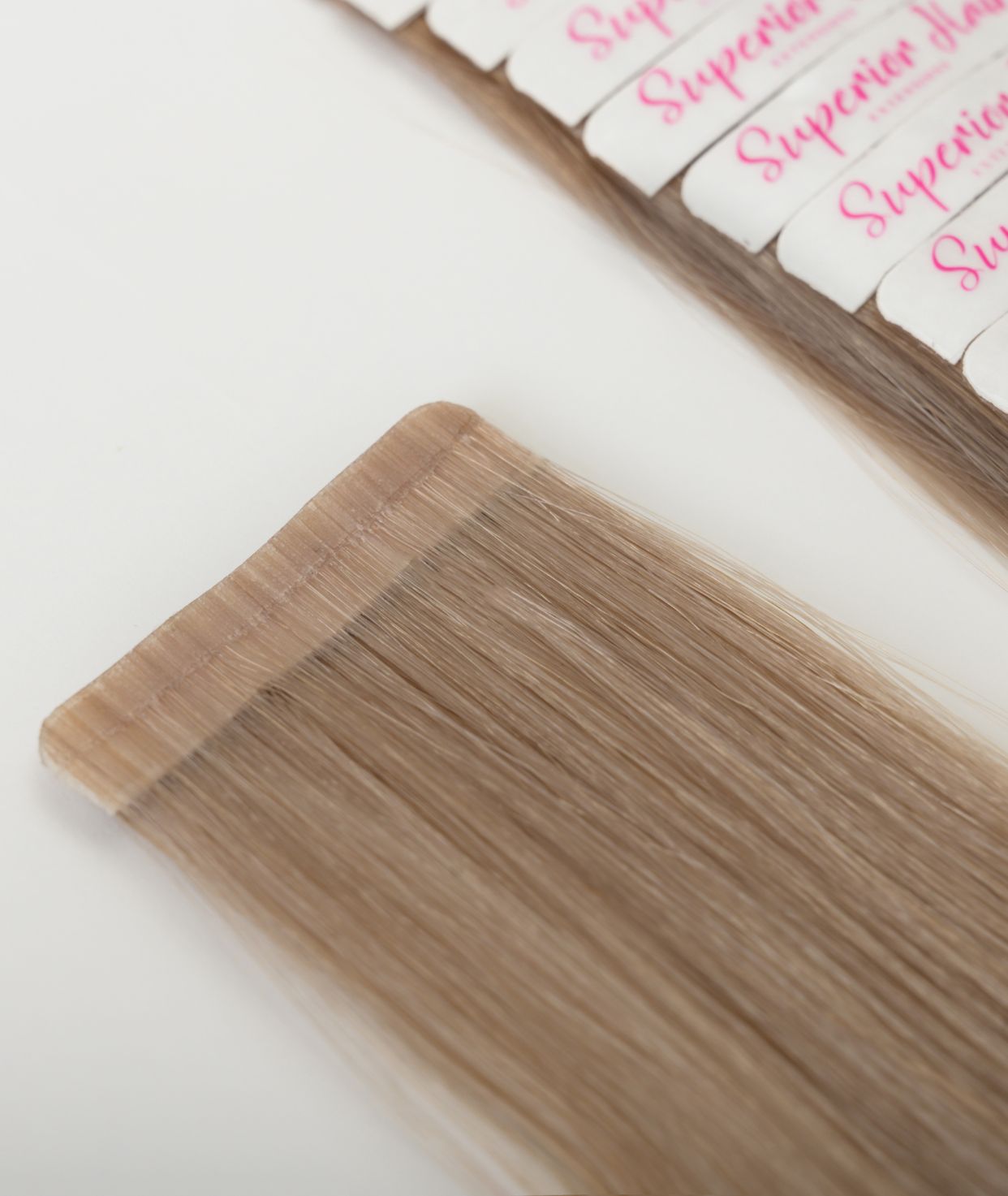 #18 Dark Ash Blonde Ultra Seamless Tape In Extensions — Value Grade