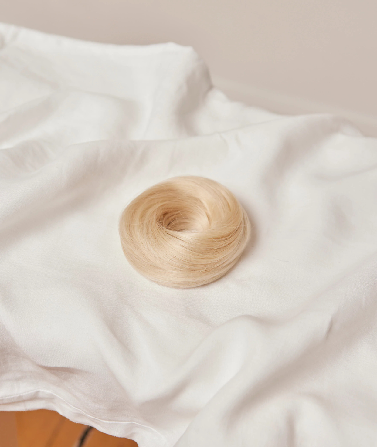 #60 Whitest Ash Blonde Messy Bun