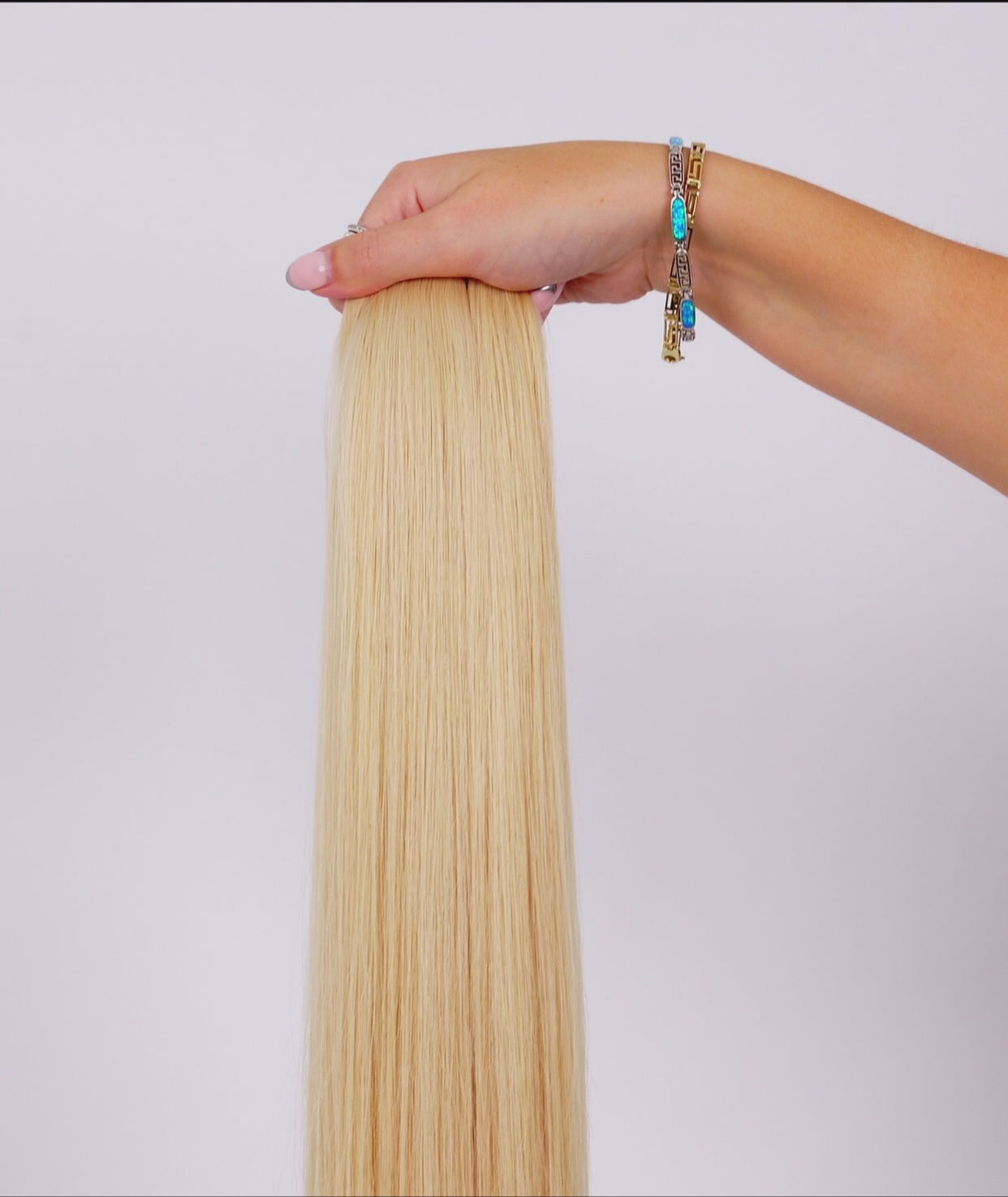 Load video: #Hollywood Blonde Ultra Seamless Tape In Extensions (NEW)