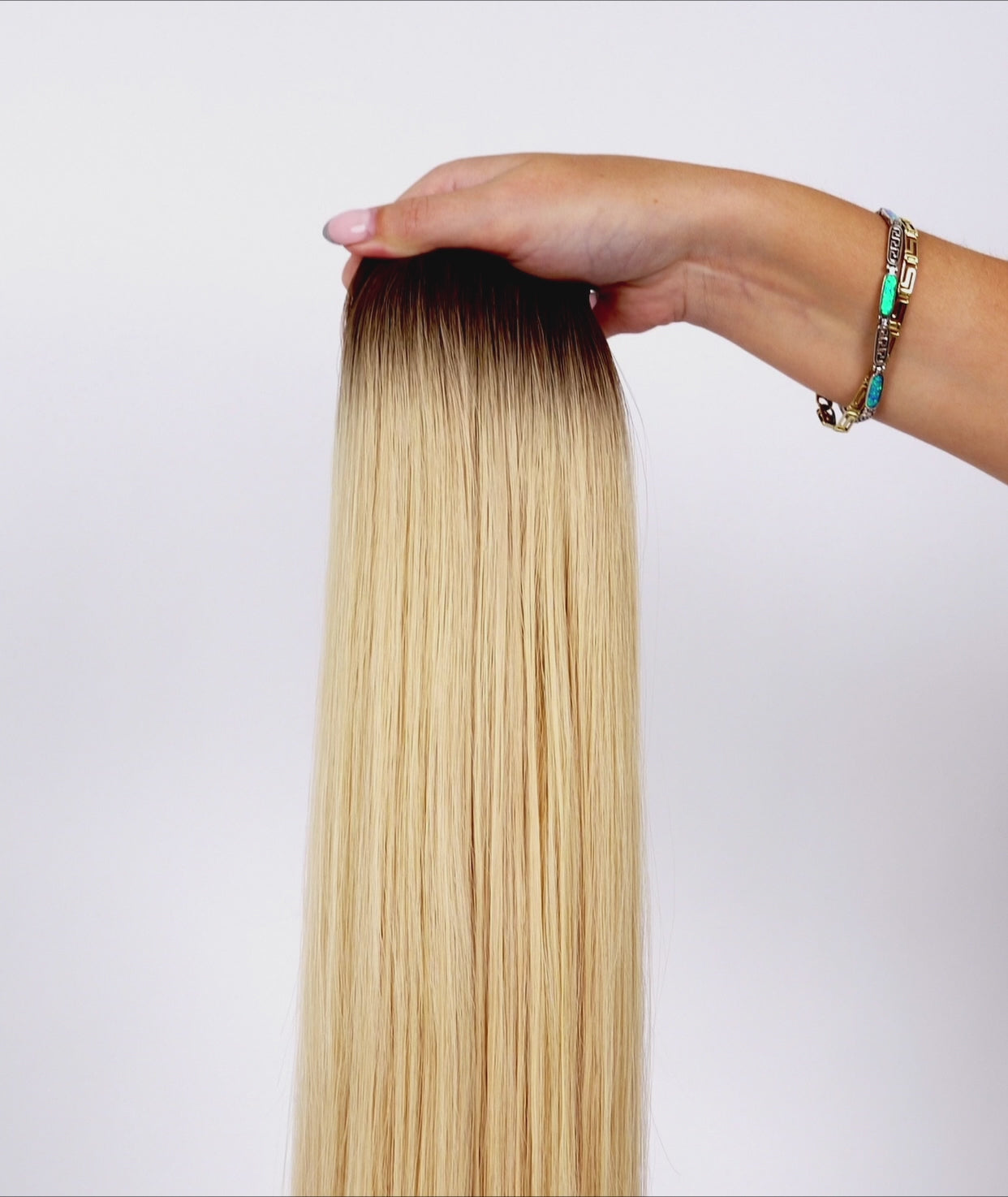 Load video: #Rooted Hollywood Blonde Ultra Seamless Tape In Extensions (NEW)