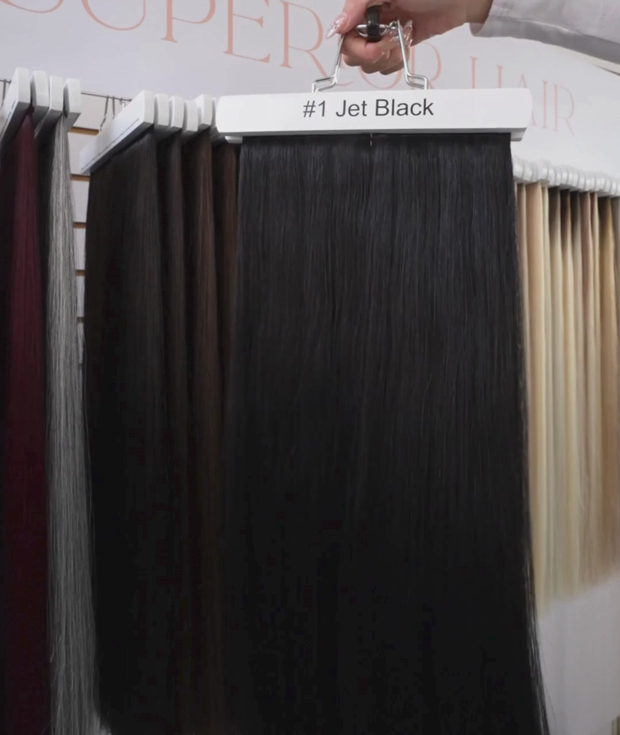 Load video: #1 Jet Black Ponytail Extensions
