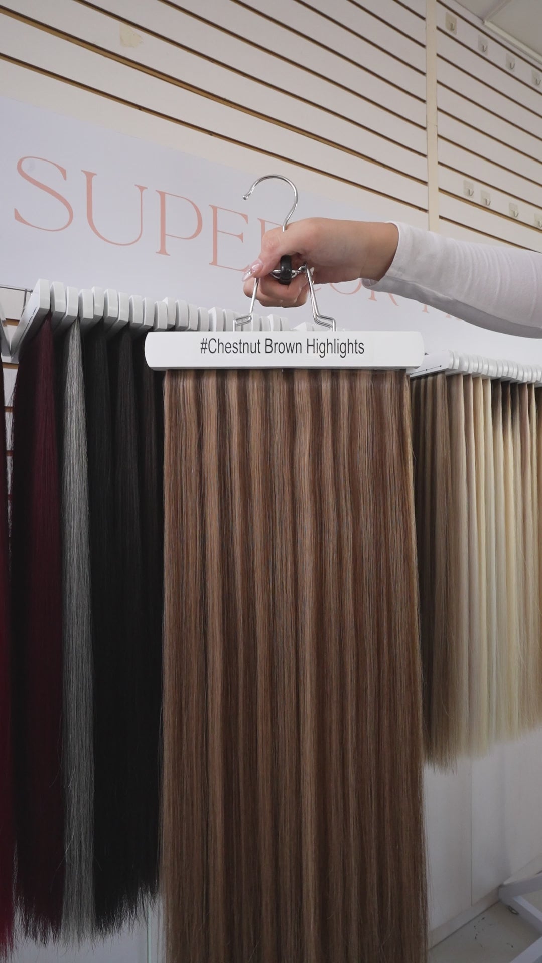 Load video: #Chestnut Brown Highlights Invisi Tape Hair Extensions