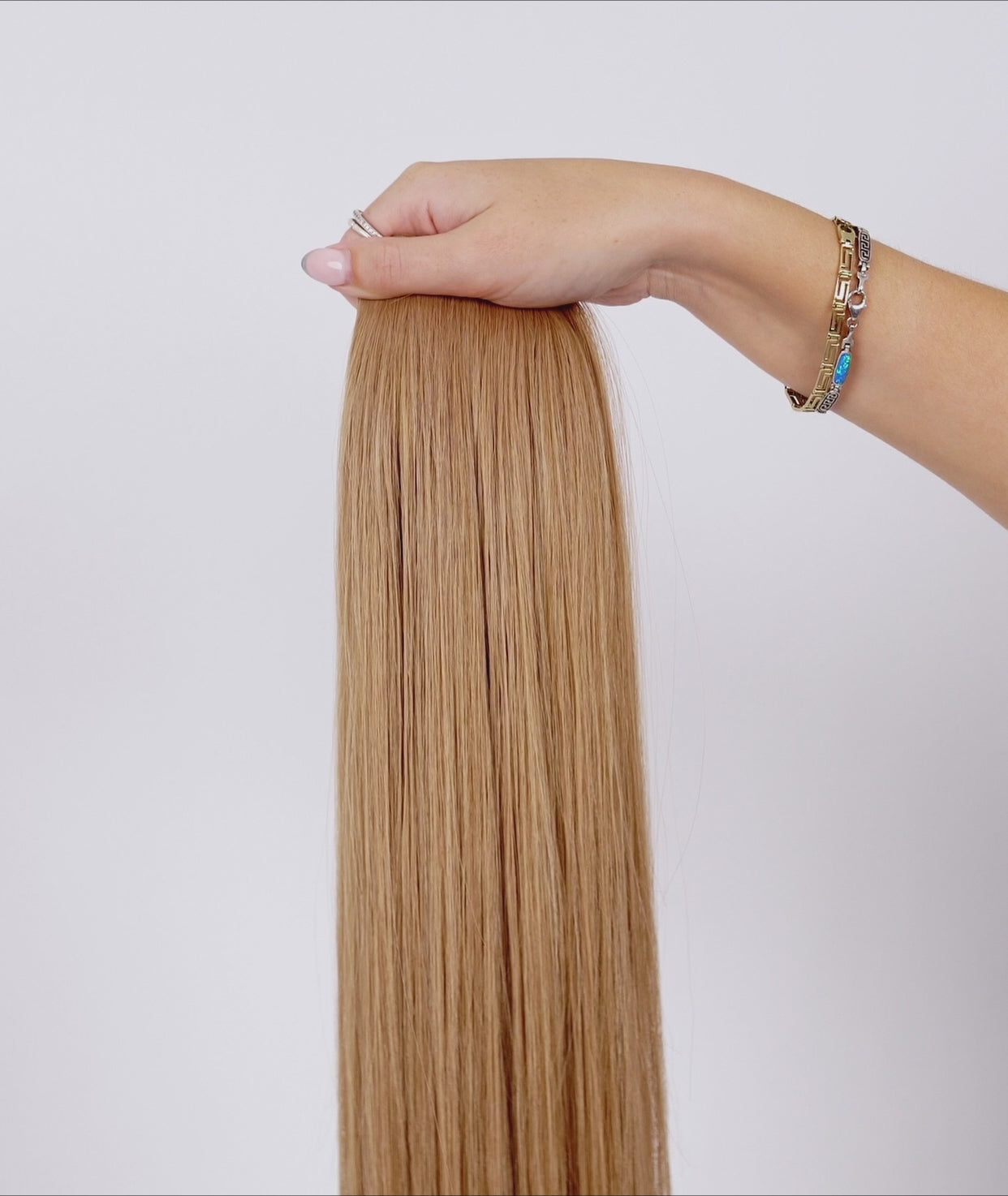 Load video: #Sunkissed Blonde Ultra Seamless Tape In Extensions (NEW)