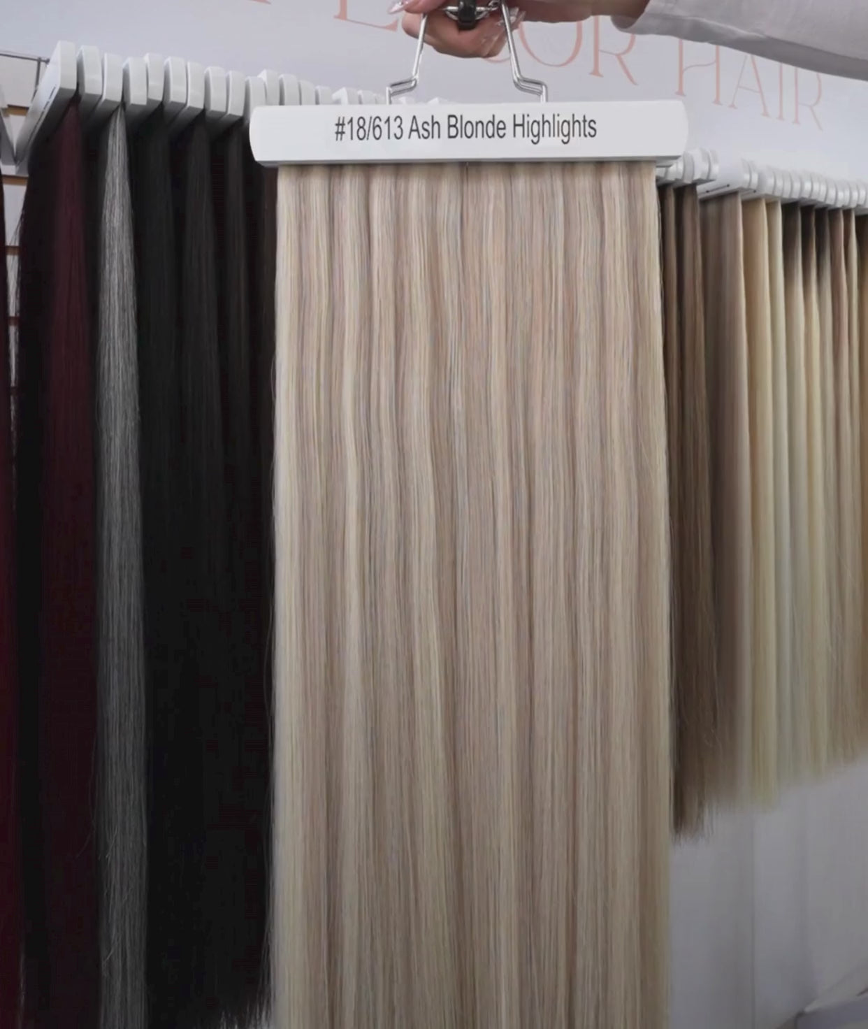 Load video: #18/613 Ash Blonde Highlights Invisi Tape Hair Extensions